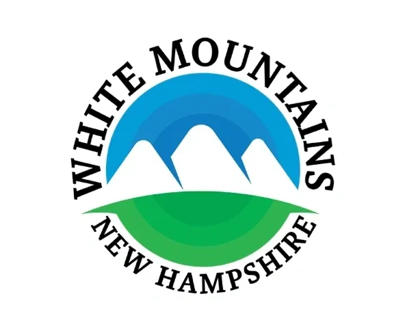 A white mountains new hampshire logo.